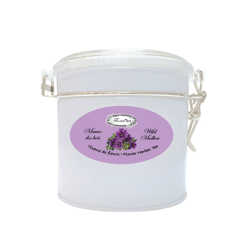 Boîte de vrac réutilisable du mélange de tisane de Mauve des bois de Les thés FloralTea gourmet et santé fait à la main au Québec avec plantes médicinales aux bienfaits anti-inflammatoire et antioxydant. Végétalien, ingrédients naturels, biologique ou sauvages, sans caféine.