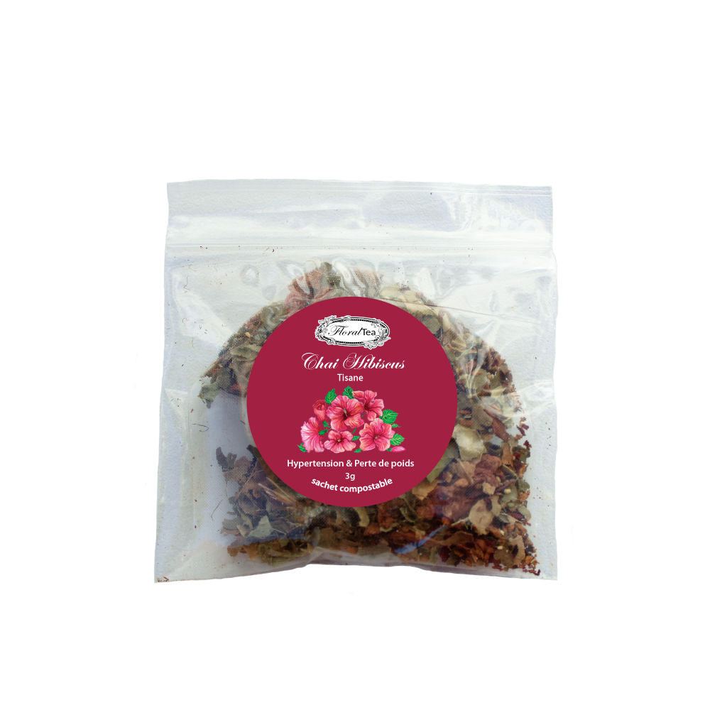 Sachet échantillon compostable du mélange de tisane de fleurs chai hibiscus de Les thés FloralTea gourmet et santé fait à la main au Québec avec plantes médicinales pour réduire la pression artérielle, aider à la perte de poids, la digestion, l’immunité et la relaxation. Végétalien, ingrédients naturels, biologique ou sauvages, sans caféine.